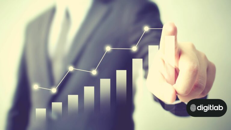 How RevOps Can Help Drive Growth For Your Business - Man in suit pointing to a digital graph hanging in mid air
