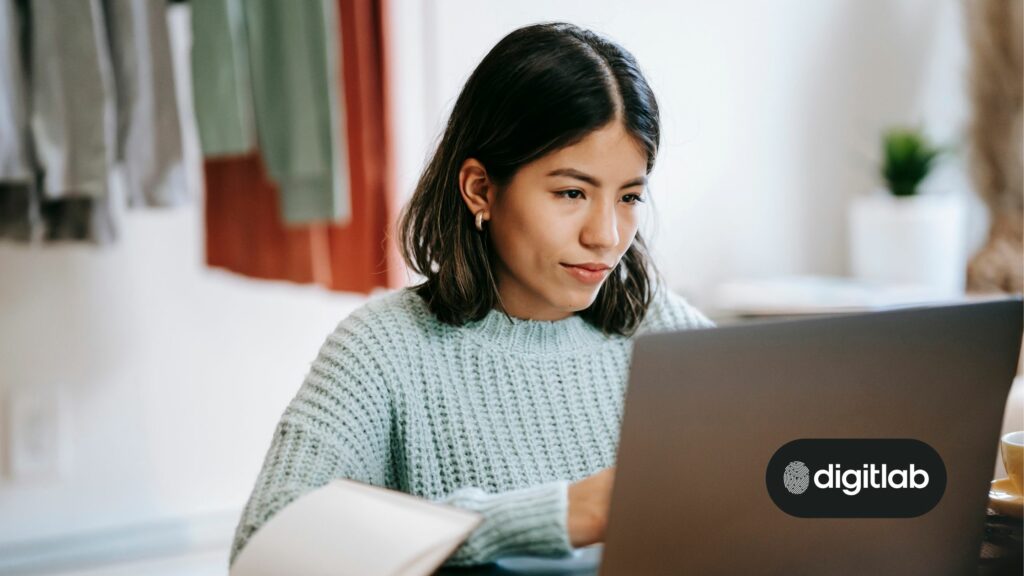 Startup marketing strategy - woman sitting behind laptop.