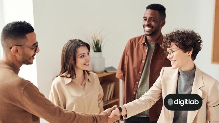 hubspot onboarding - team of people welcoming a woman with a hand shake.