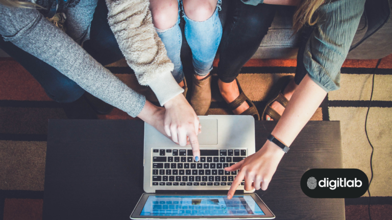 The Quintessential Five: Sales Content that Boosts B2B Revenue - fingers pointing at laptop